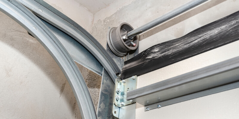 What Purpose does a garage door strut serve?